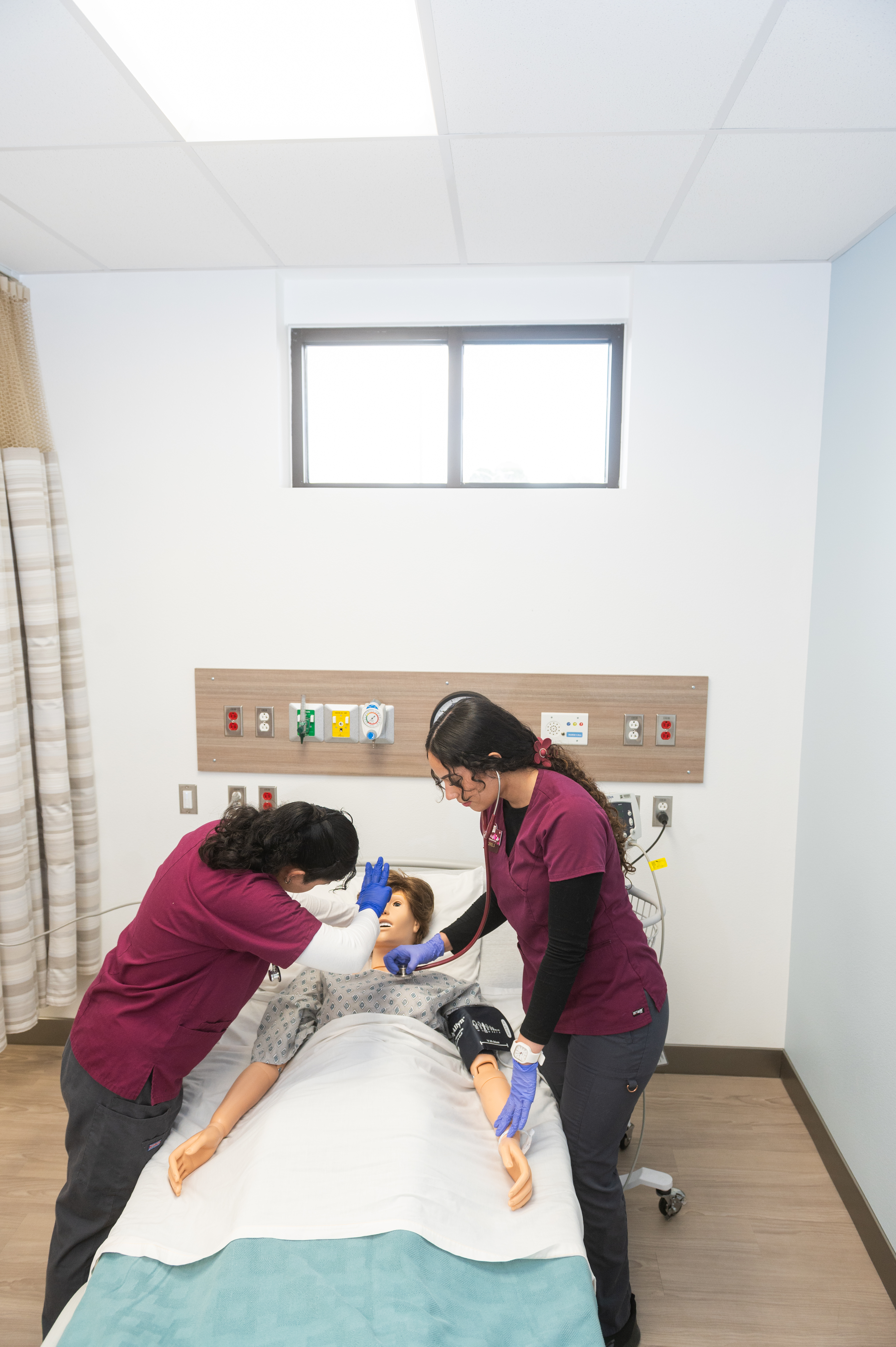 nursing students working in a lab